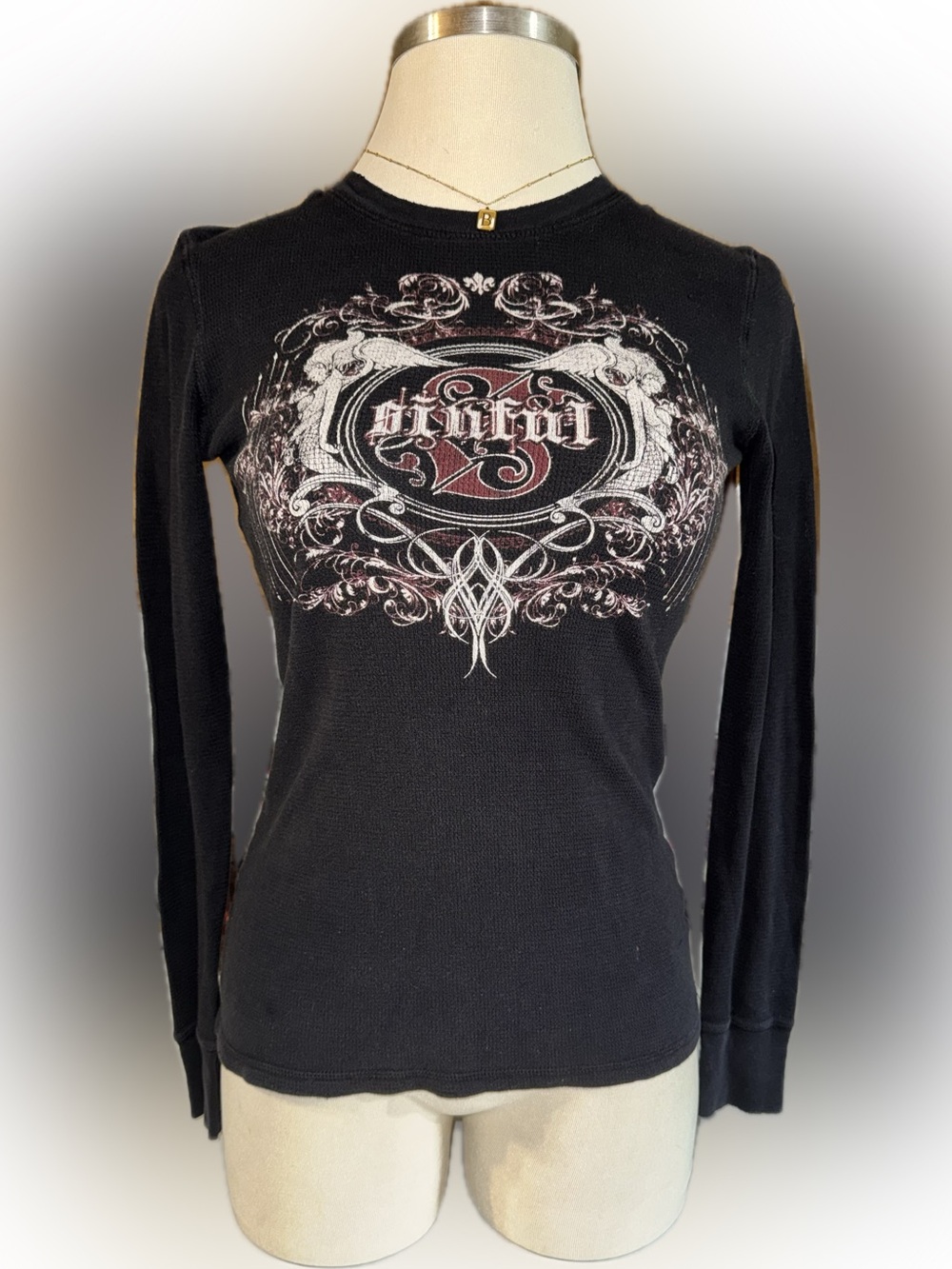 Women’s Sinful Black Long-Sleeve Graphic Top with Red & White Crest